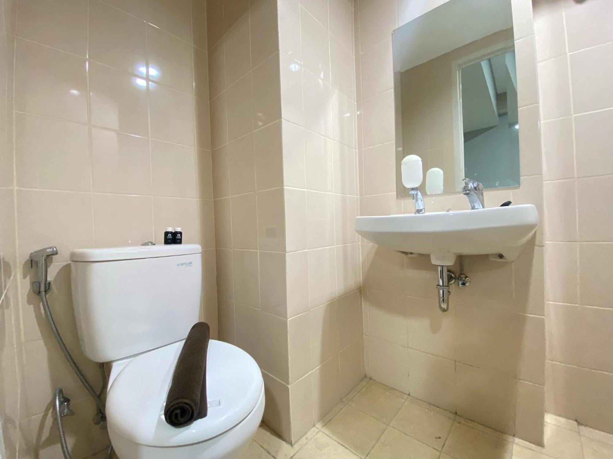 Apartemen Cozy 1br At Parahyangan By Travelio